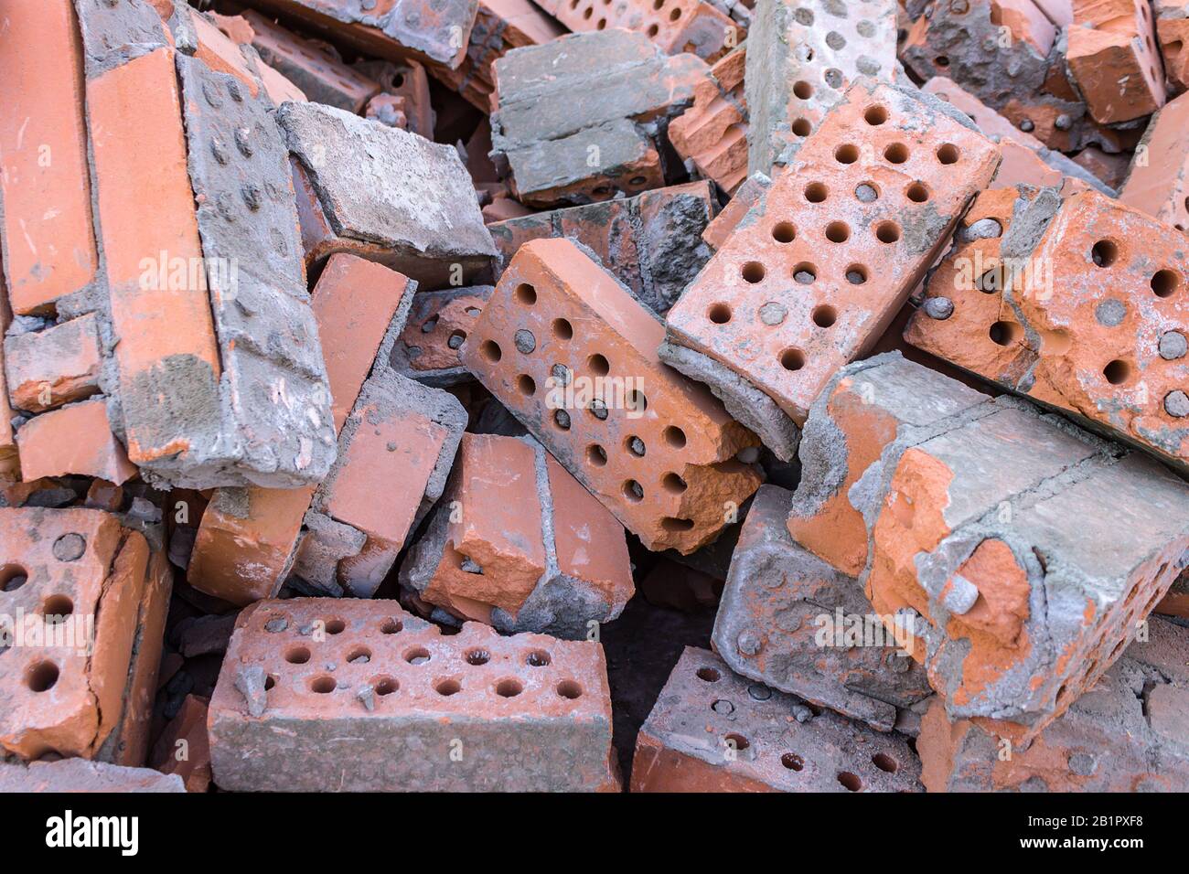 A pile of broken bricks after the demolition of a building. Landfill of