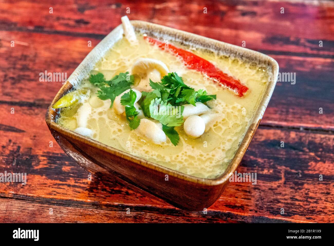 Traditional Thai Tom Kha (Coconut) soup Stock Photo