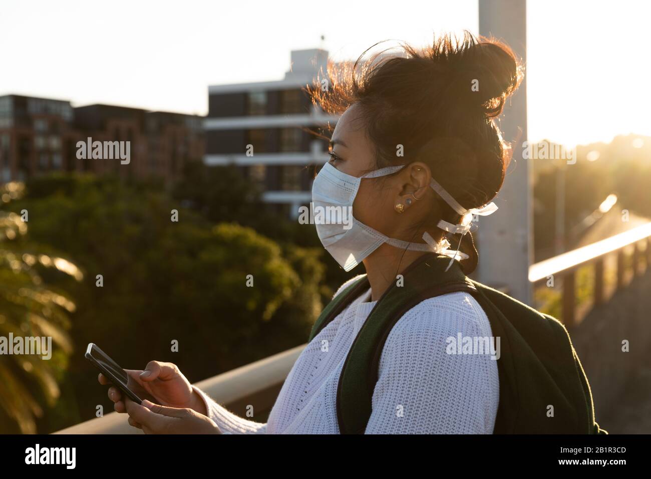 Woman wearing a Corona Virus face mask Stock Photo