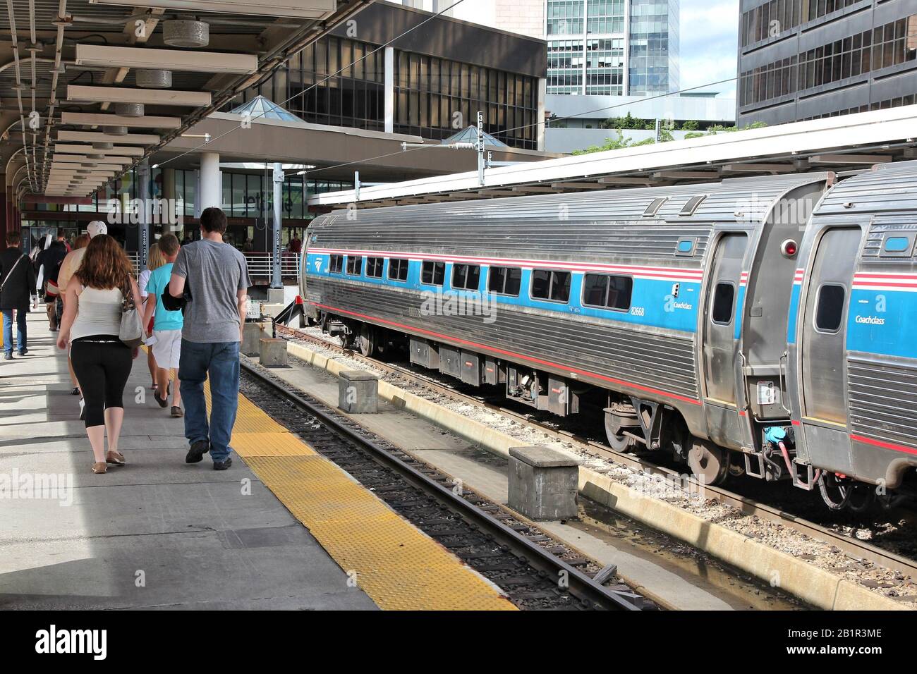 U.S.A train station BOSTON, USA - JUNE 8, 2013: Passengers visit South Station Train Terminal  in Boston. The railway station has services of Amtrak trains and MBTA  public Stock Photo - Alamy