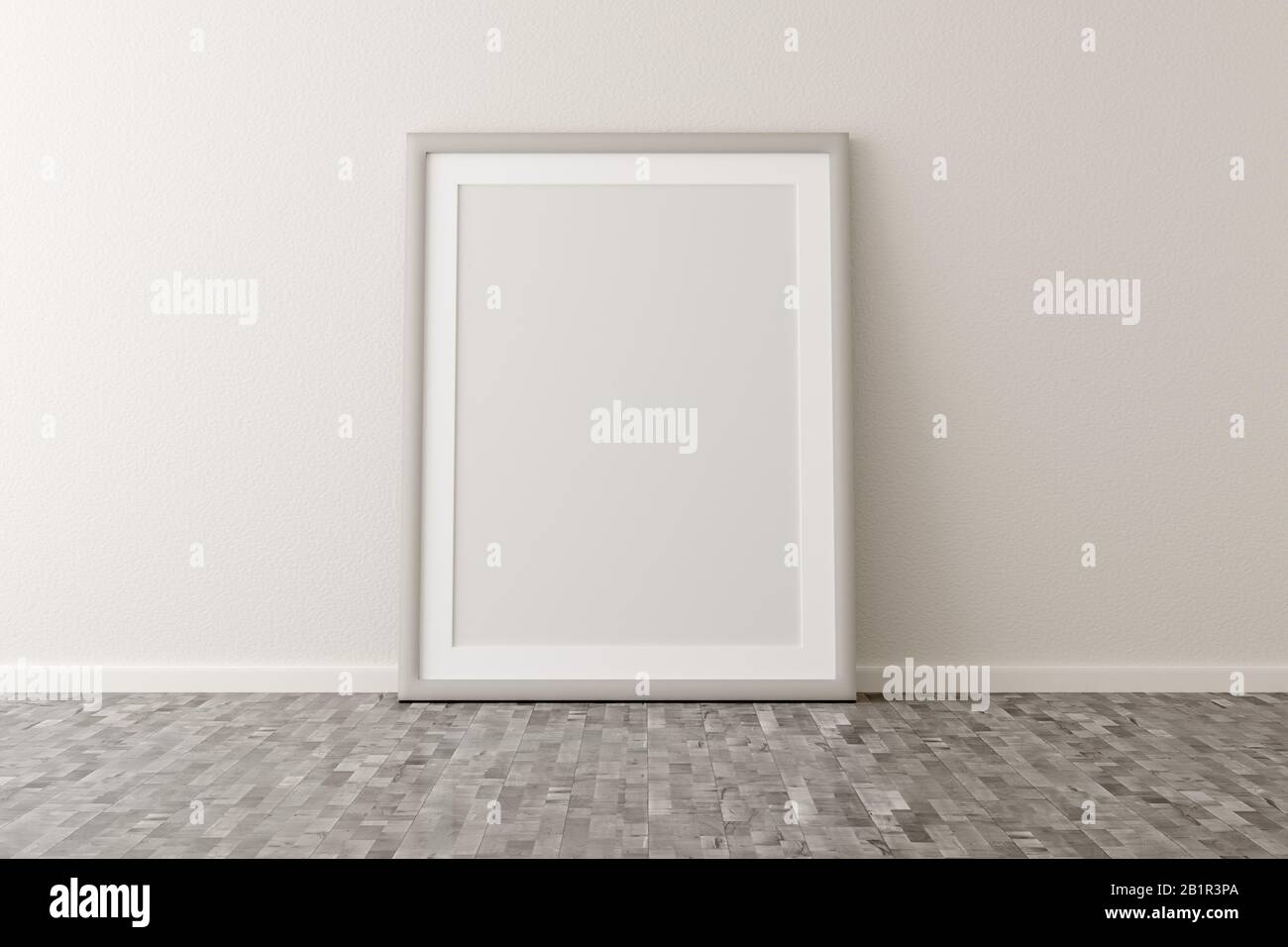 Empty picture frame leaning against white wall in bright room with brown wooden floor with copy space - portfolio, gallery or artwork template mock up Stock Photo