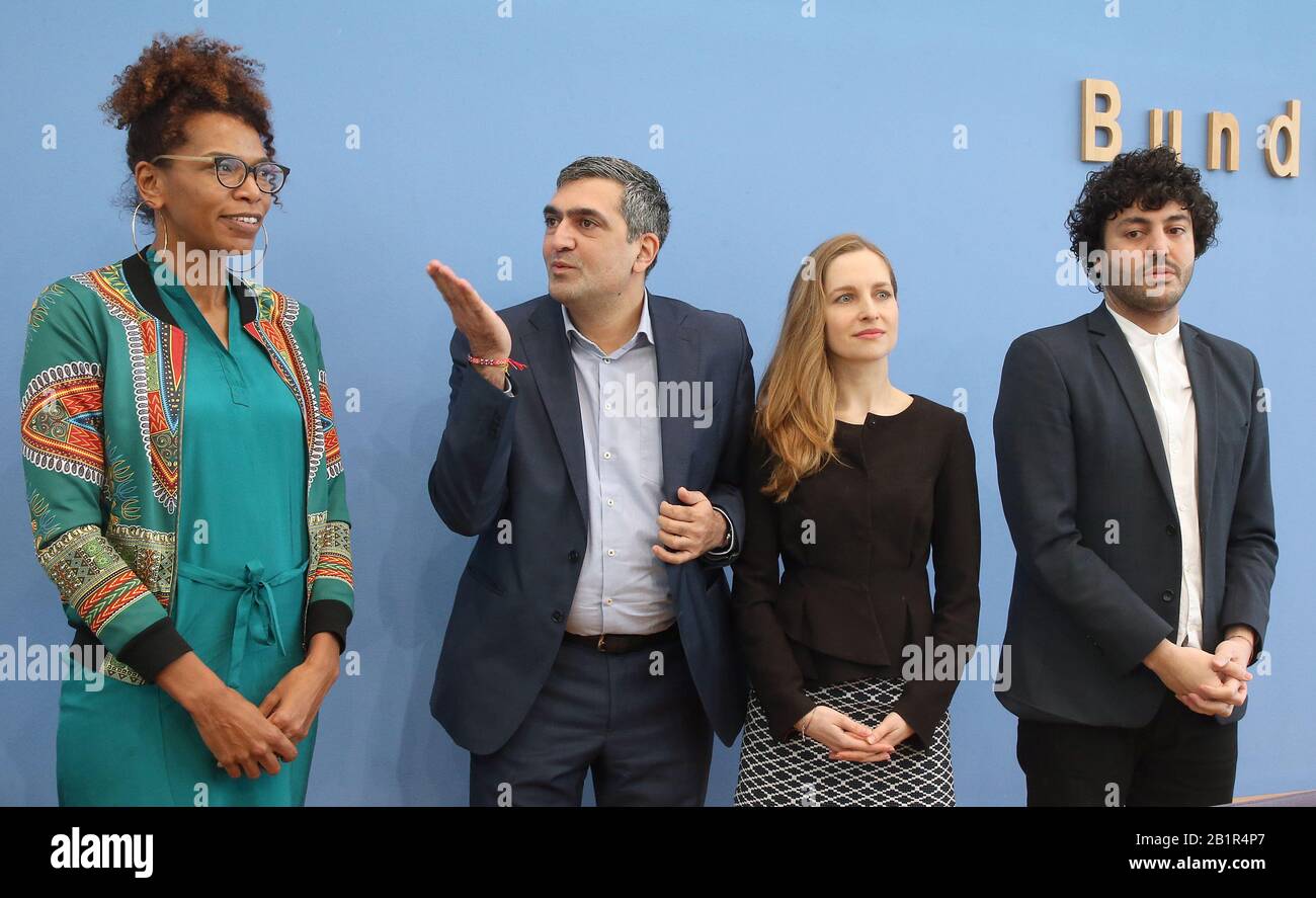 Berlin, Germany. 27th Feb, 2020. Saraya Gomis (l-r), from Each One Teach One (EOTO) e.V., Farhad Dilmaghani, chairman of DeutschPlus e.V., Marta Neüff, chairwoman of the Polish Social Council e.V., and Cihan Sinanoglu, press spokesman of the Turkish Community in Germany e.V., are standing at a press conference of migrant organisations on the attack in Hanau. At the same time, a special session of the Bundestag's Committee on Internal Affairs on the racist attack in Hanau takes place, Credit: Wolfgang Kumm/dpa/Alamy Live News Stock Photo