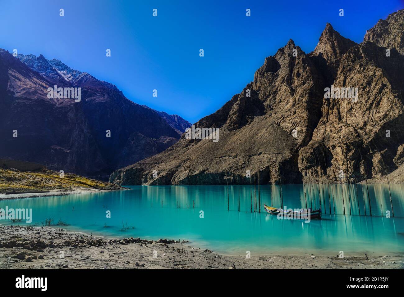 Attabad Lake, Gojal Valley, Hunza, Gilgit Baltistan, Pakistan formed after the 2010 Attabad Disaster and now a popular tourist attraction in a scenic Stock Photo