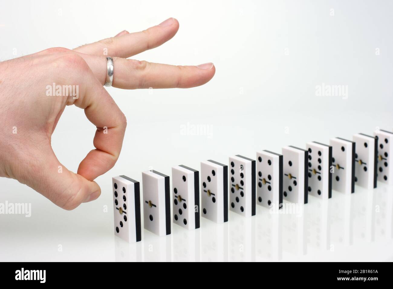 Domino chain reaction hi-res stock photography and images - Alamy
