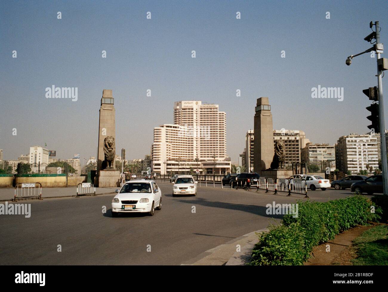 Travel Photography - The lions of Qasr al-Nil Bridge spanning the River Nile in Central Downtown Cairo in Egypt in North Africa. Wanderlust Stock Photo