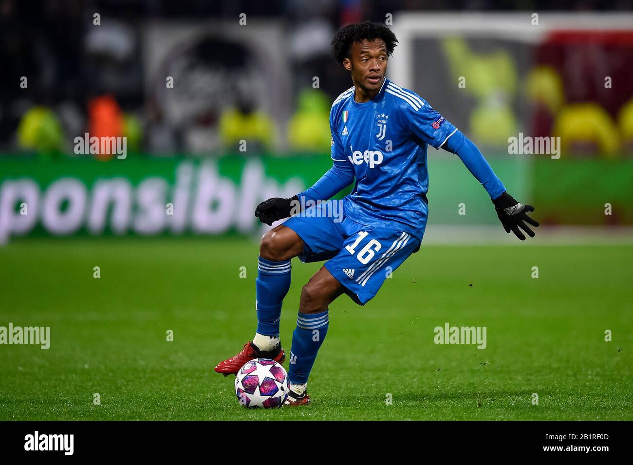 Lyon, Italy. 26th Feb, 2020. LYON, ITALY - February 26, 2020: Juan Cuadrado  of Juventus FC in action during the UEFA Champions League round of 16 first  leg football match between Olympique