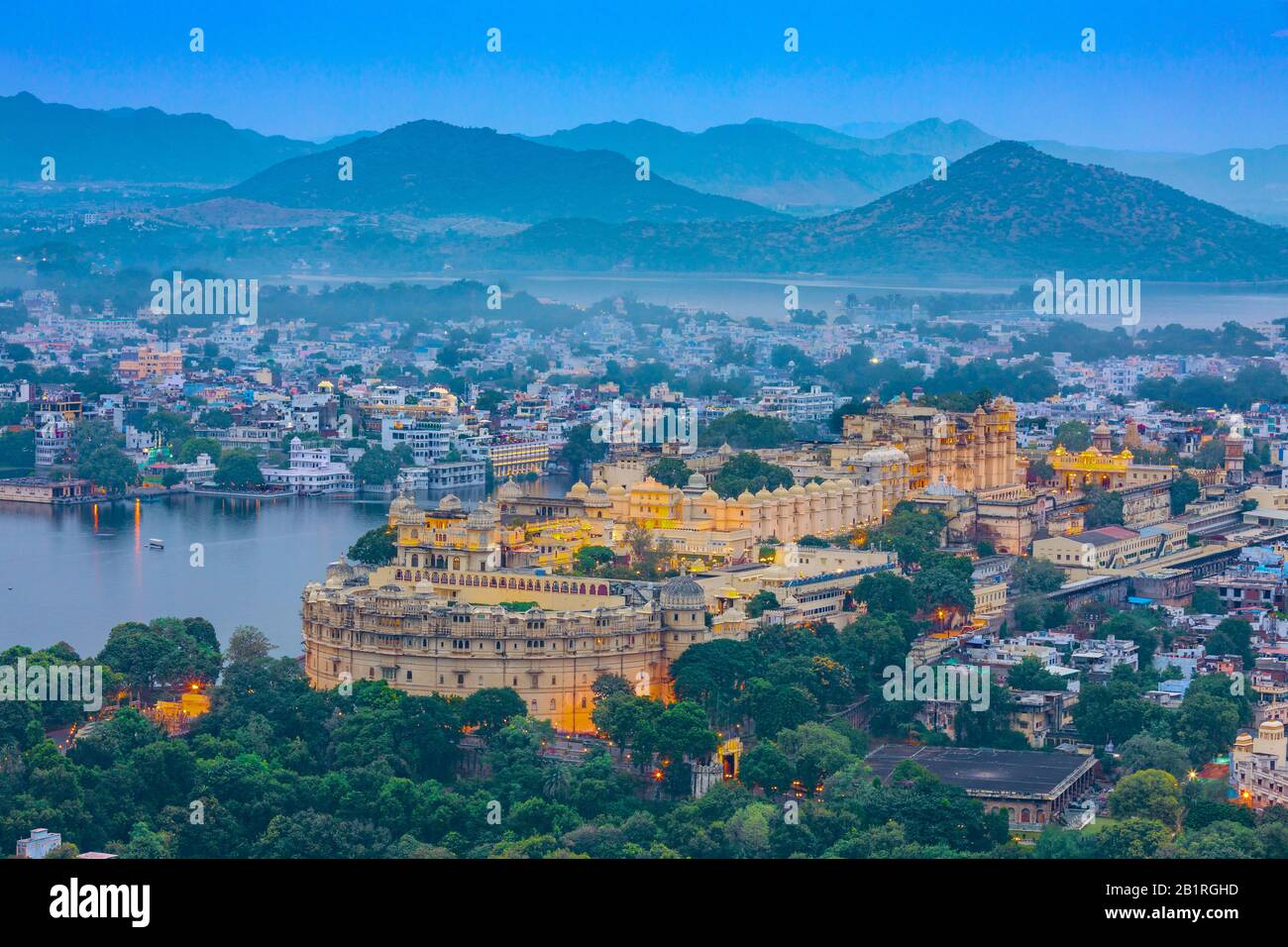 Aerial view of City Palace at night. Udaipur, Rajasthan, India Stock Photo
