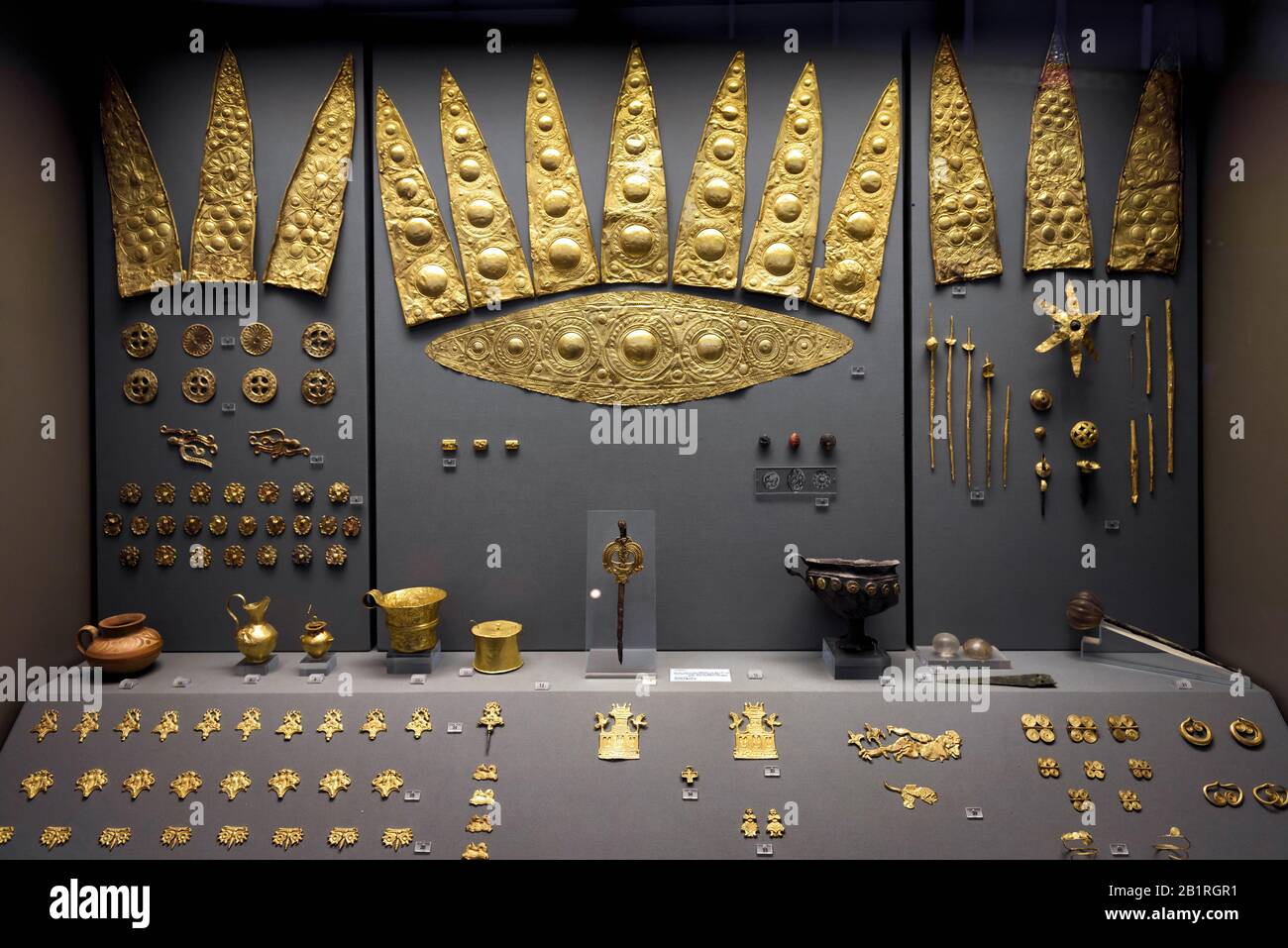 Athens - May 7, 2018: Gold jewelry from ancient Greek Mycenae. Golden crowns and other precious objects in the National Archaeological Museum in Athen Stock Photo