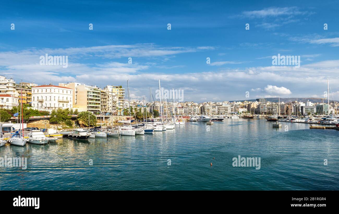 Bay of Zea or Pasalimani in Piraeus, Athens, Greece. Panoramic view of a beautiful harbor with sail boats. Panorama of the city with sea port in summe Stock Photo
