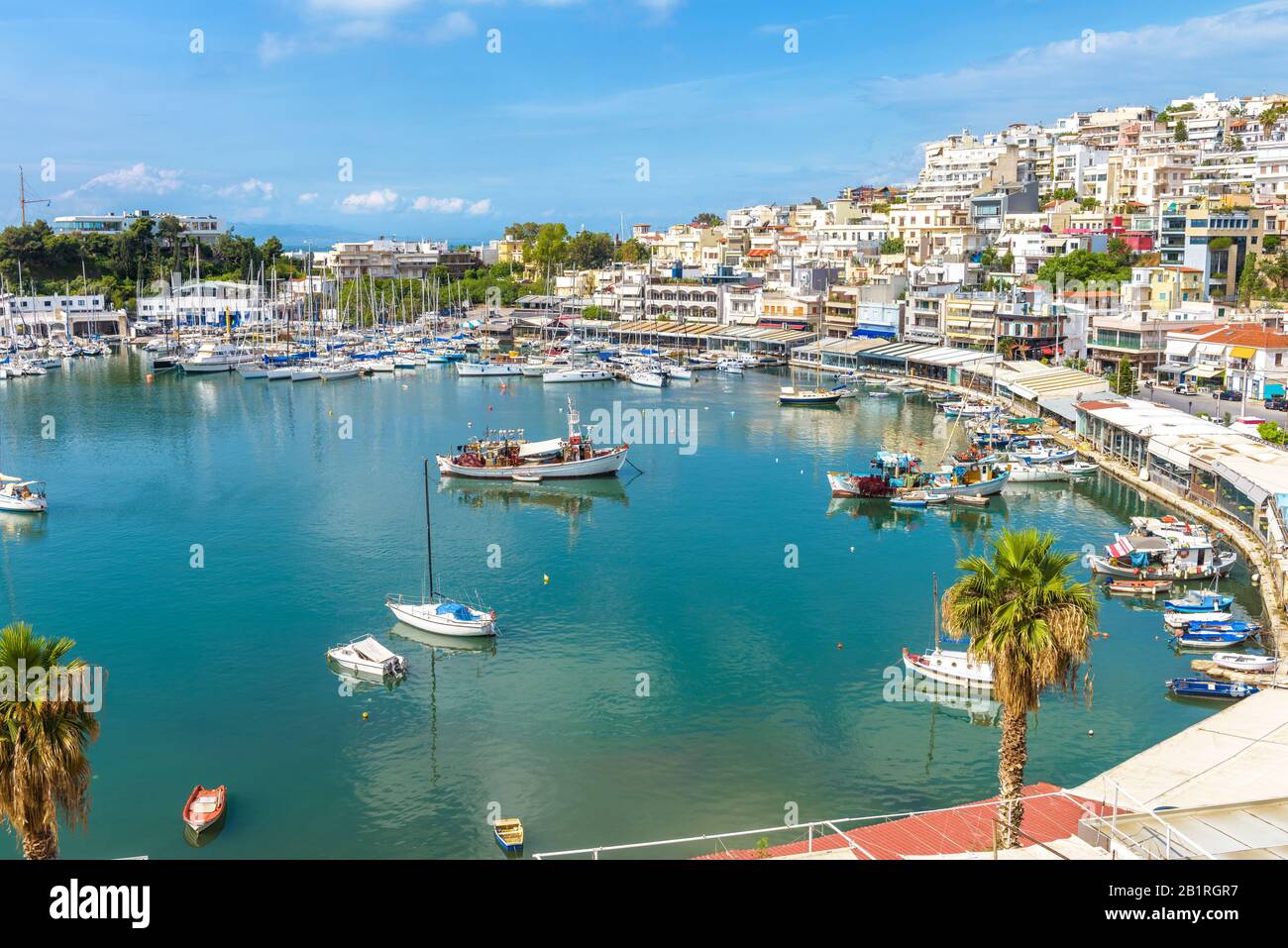 Mikrolimano marina in Piraeus, Athens, Greece. Panoramic view of the beautiful harbor with sail boats. Scenery of the city coast with scenic sea port. Stock Photo