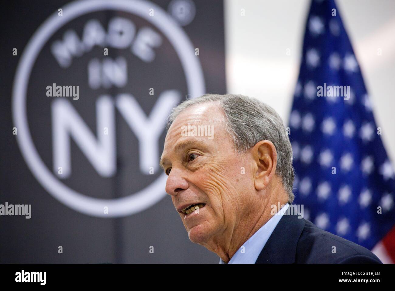 New York City mayor Michael J. Bloomberg at the opening of the new Steiner Studios in Brooklyn Navy Yard. New York has always had a thriving movie industry, but in tough competition with cities on the west coast and in Canada. Behind him is a new trademarked logo with the words 'Made in NY'. Stock Photo