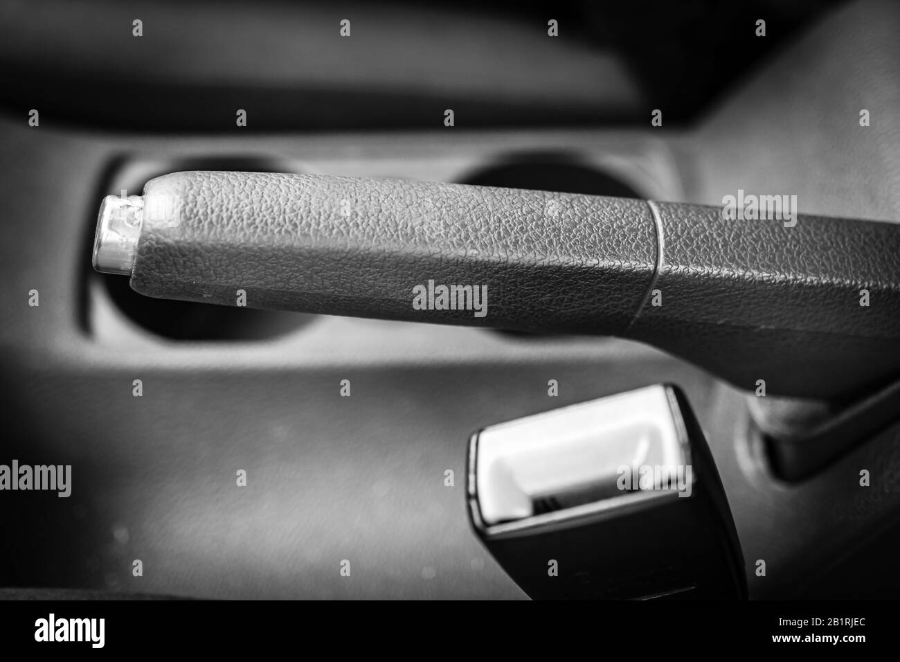 Close up photo inside a car, hand brake emergency brake isolated Stock
