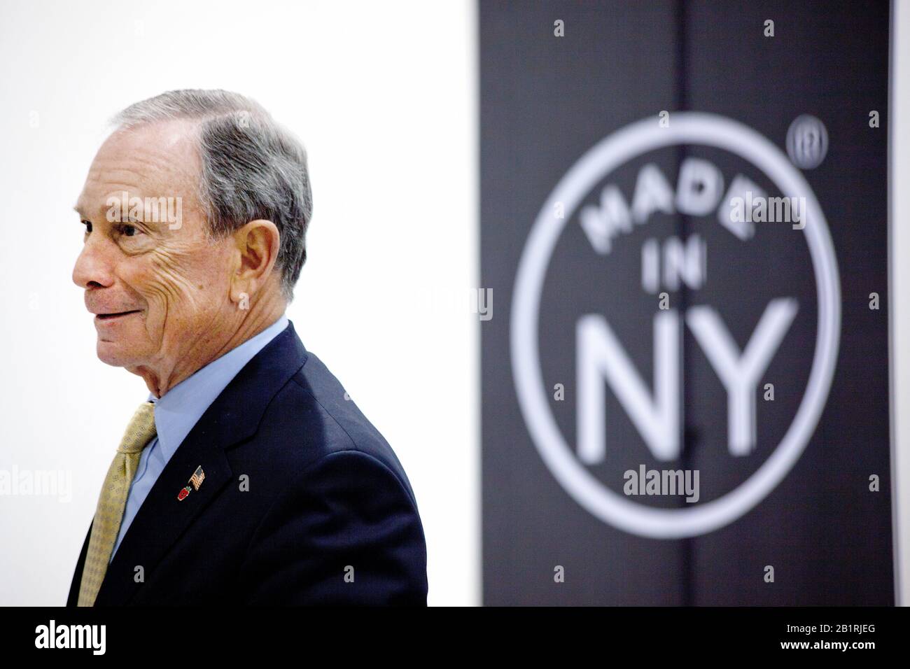 New York City mayor Michael J. Bloomberg at the opening of the new Steiner Studios in Brooklyn Navy Yard. New York has always had a thriving movie industry, but in tough competition with cities on the west coast and in Canada. Behind him is a new trademarked logo with the words 'Made in NY'. Stock Photo
