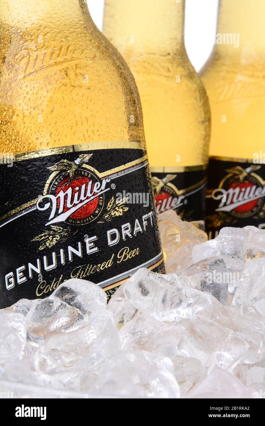 IRVINE, CA - MAY 30, 2014: Closeup of Miller Genuine Draft bottles in ice. MGD is actually made from the same recipe as Miller High Life except it is Stock Photo