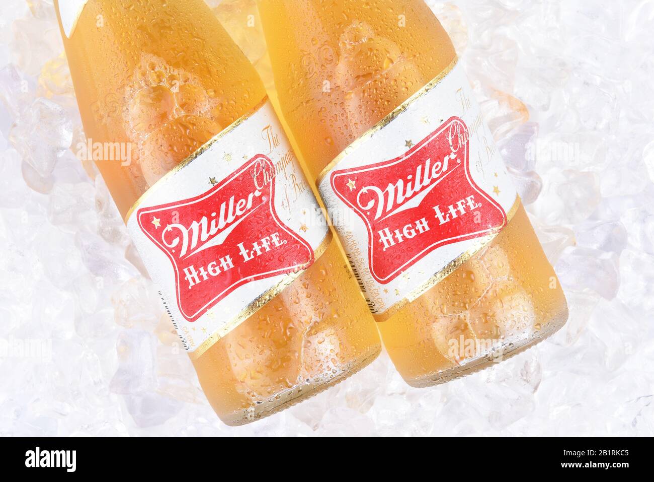 IRVINE, CA - APRIL 10, 2017: Miller High Life bottles on ice. High Life, a pilsner style beer, is Millers oldest brand entering the market in 1903 Stock Photo