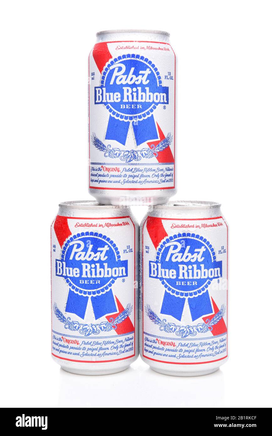 IRVINE, CALIFORNIA - MARCH 16, 2017: Pabst Blue Ribbon Beer. Three stacked cans of the American brand introduced in 1884 in Milwaukee, currently based Stock Photo