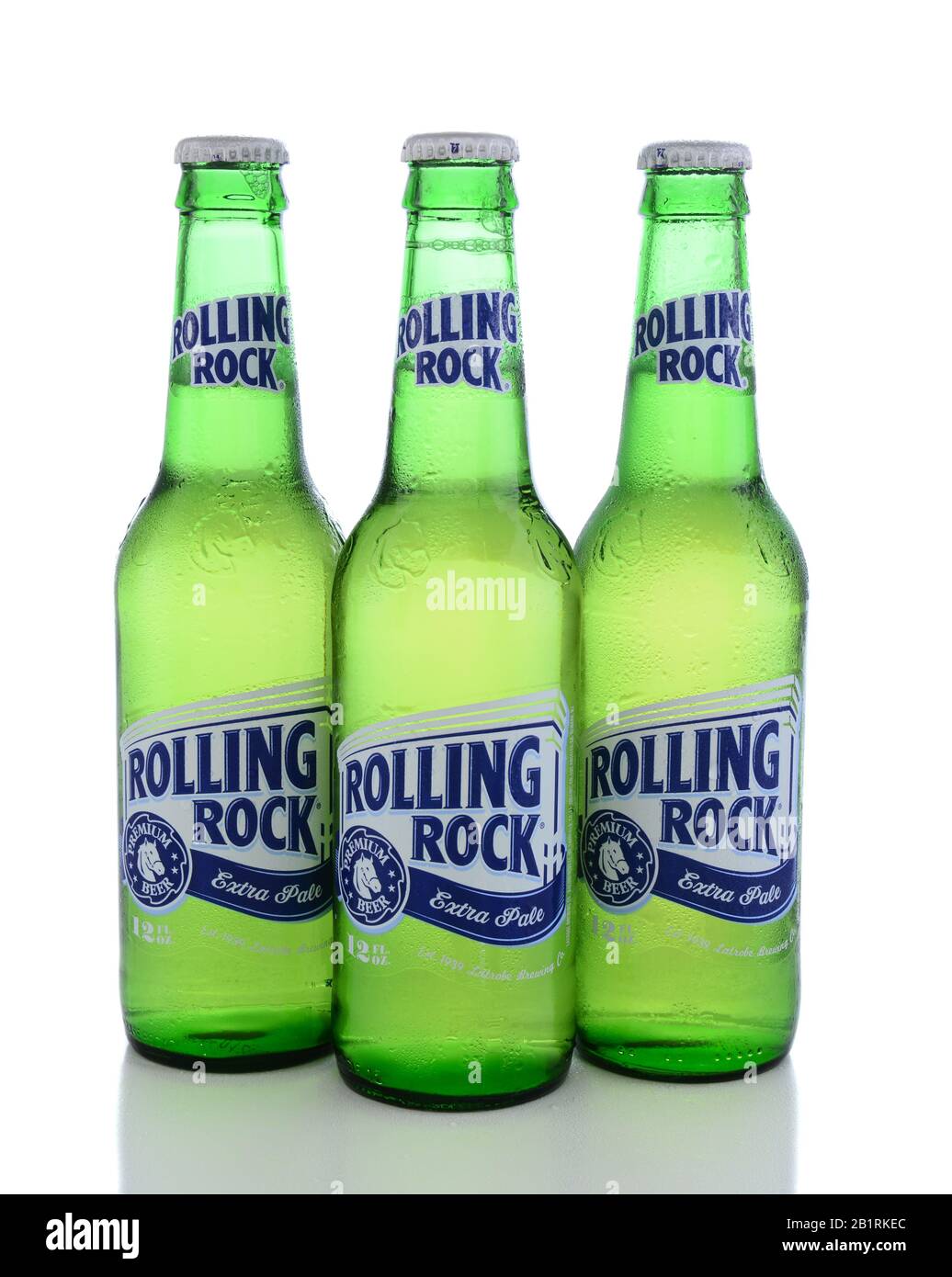 IRVINE, CA - JUNE 14, 2015: Rolling Rock Extra Pale Beer. Three bottles of the American beer founded in 1939 in Latrobe, Pennsylvania, by the Latrobe Stock Photo