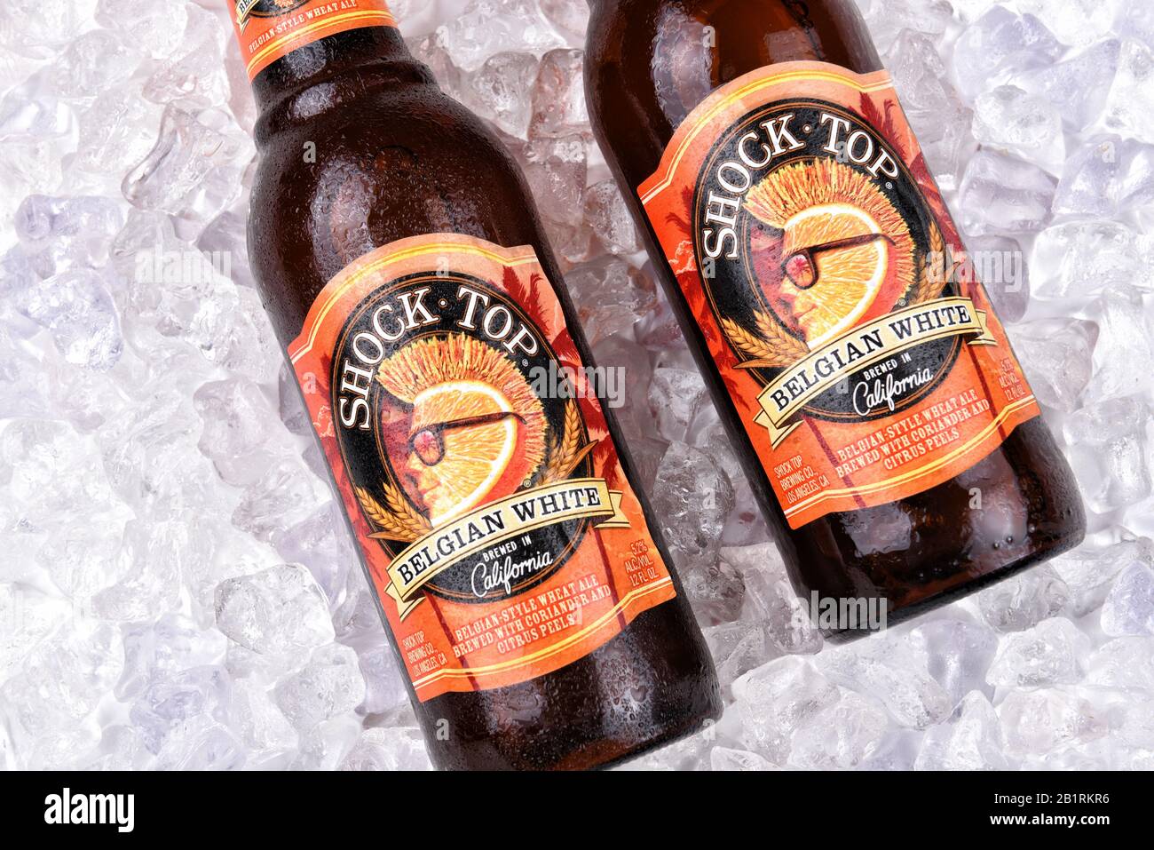 IRVINE, CALIFORNIA - AUGUST 25, 2016: Shock Top Belgian White bottles in ice. Introduced as a seasonal beer in 2006, it has, since 2007, been availabl Stock Photo