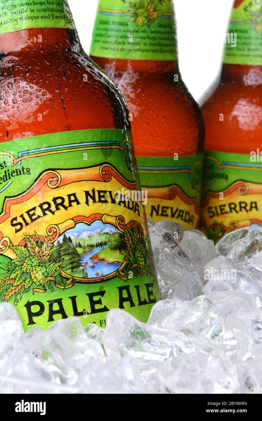 IRVINE, CA - MAY 30, 2014: Closeup of Sierra Nevada Pale Ale bottles in ice. Sierra Nevada Brewing Co. was established in 1980 by homebrewers in Chico Stock Photo