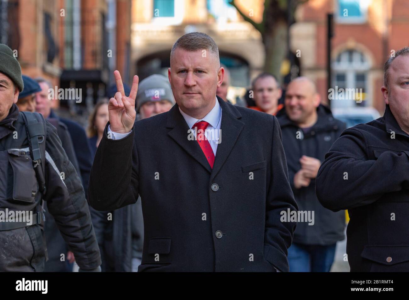 London, UK. 27th Feb, 2020. Paul Golding, Britain First leader, meets with his supporters at Marleybone Station  before making the short walk to Westminster Magistrates Court where he charged with refusing to comply with a duty under Schedule 7 of the Terrorism Act. He is alleged to have refused to give pin codes for electronic devices when he was stopped at Heathrow airport, returning from a trip to the Russian Parliament in Moscow. Penelope Barritt/Alamy Live News Stock Photo
