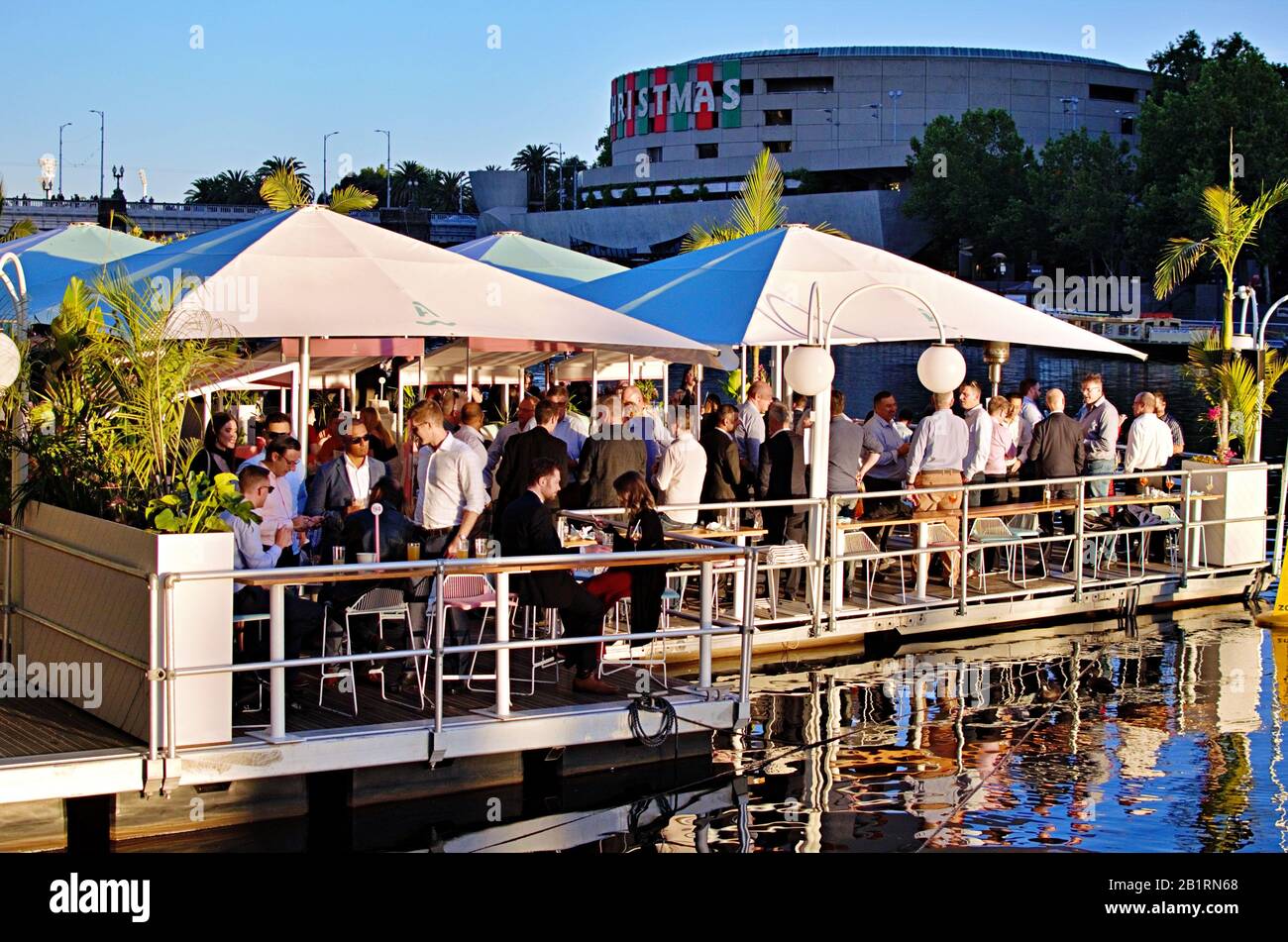 Social event party at Arbory Afloat floating bar on the Yarra River, Melbourne, Victoria, Australia Stock Photo
