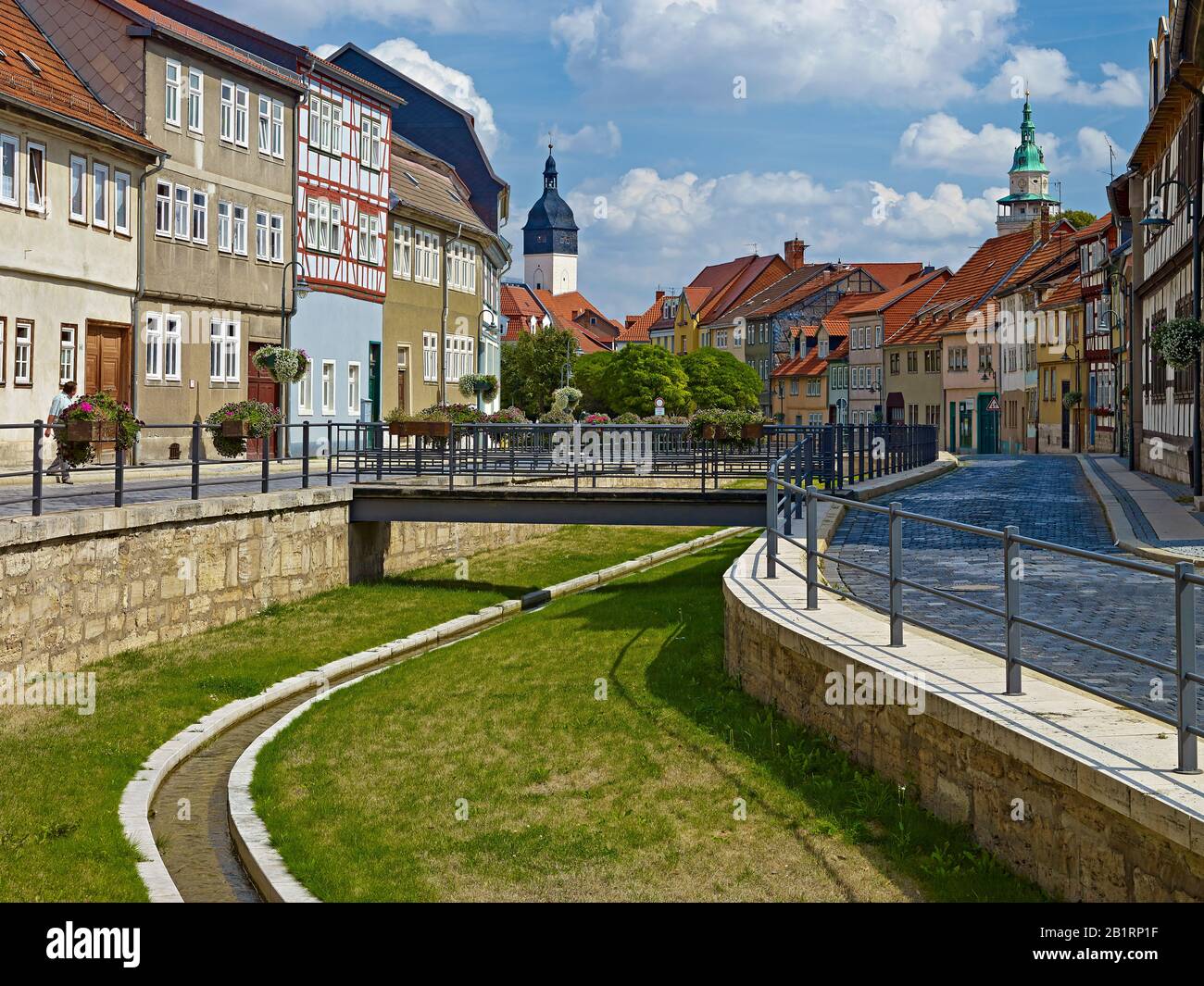 Long street with town hall tower and church tower of Bonifatiuskirche in Bad Langensalza, Thuringia, Germany, Stock Photo