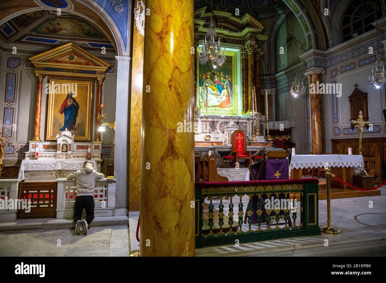 People praying in the Holy Spirit Cathedral, also known as the St