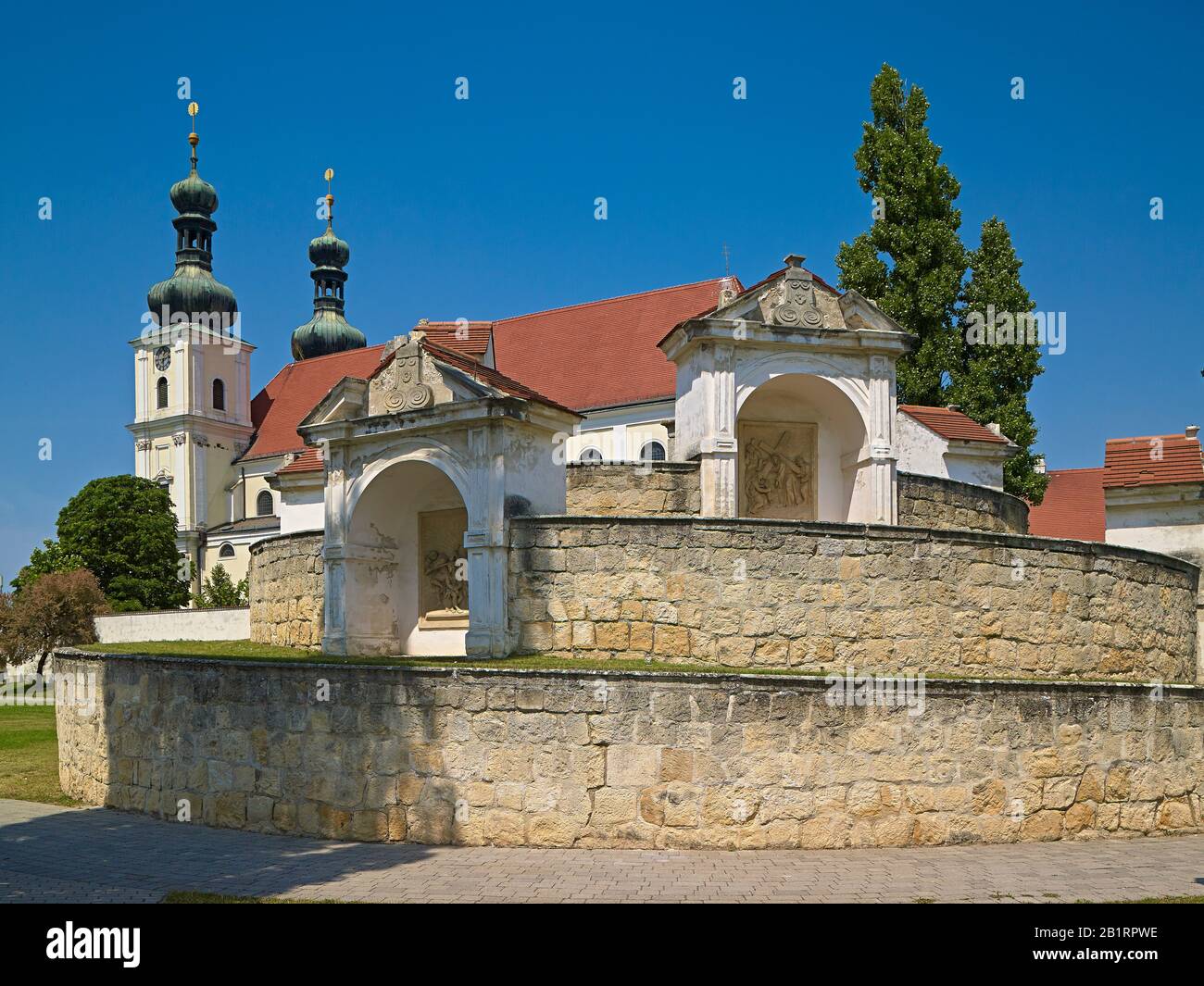 Calvary and basilica in Frauenkirchen, Burgenland, Austria, Stock Photo