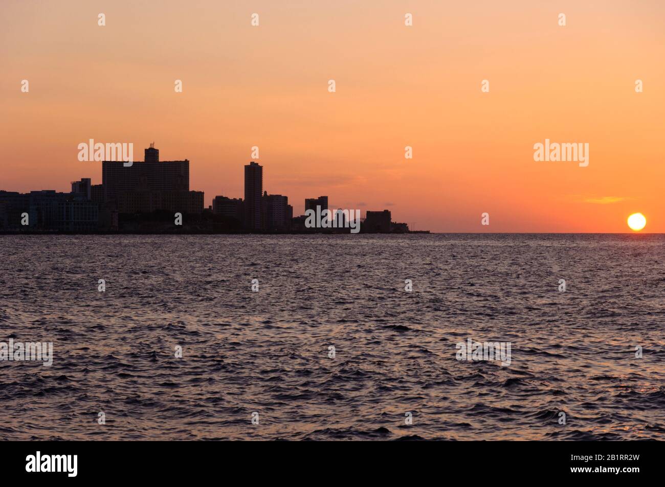Havana skyline in sunset with FOCSA Building and Hotel Nacional, Cuba, Caribbean, Stock Photo