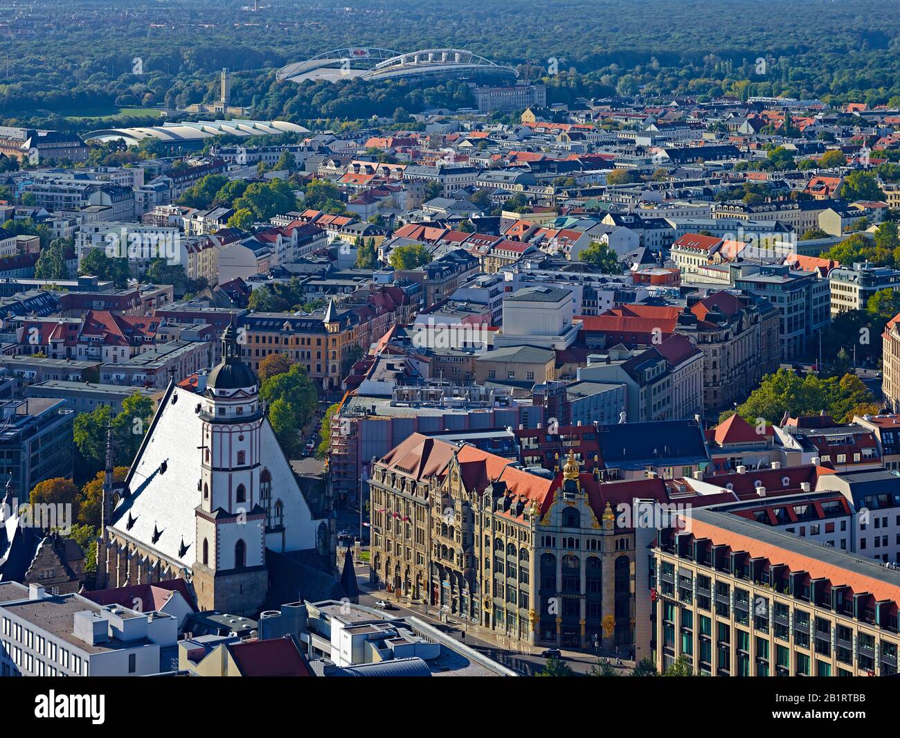 St. Thomas Church and Red Bull Arena in Leipzig, Saxony, Germany Stock Photo