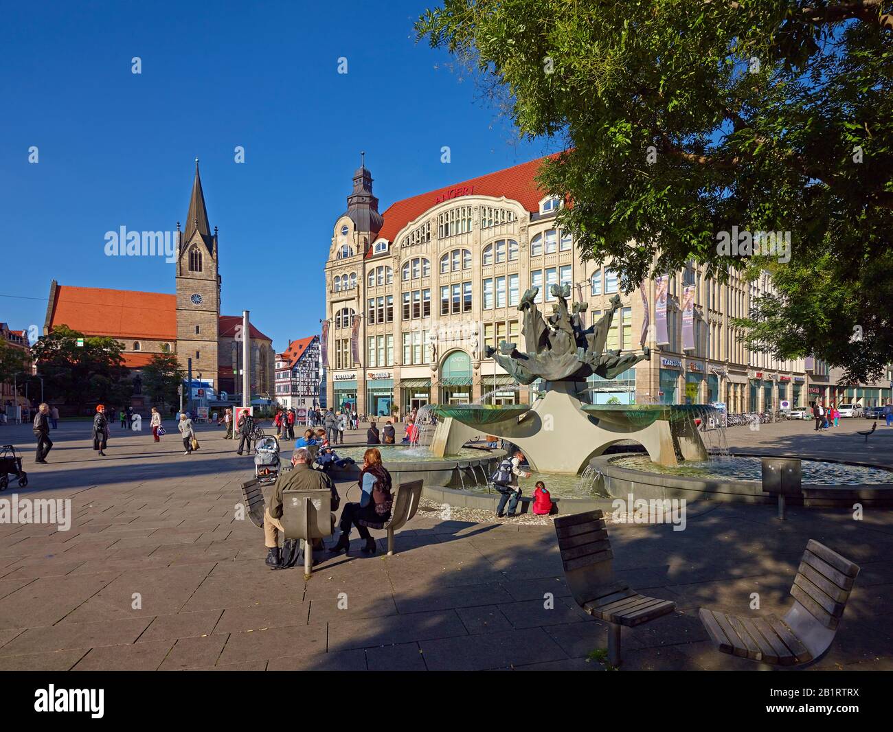 Kaufmannskirche and Anger1 department store with fountain in Erfurt, Thuringia, Germany Stock Photo