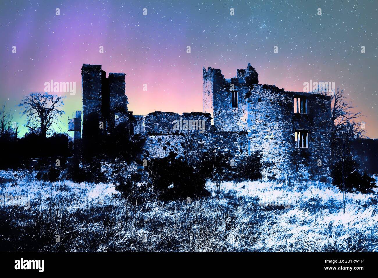 Image of a ghostly castle ruins under the night sky Stock Photo - Alamy