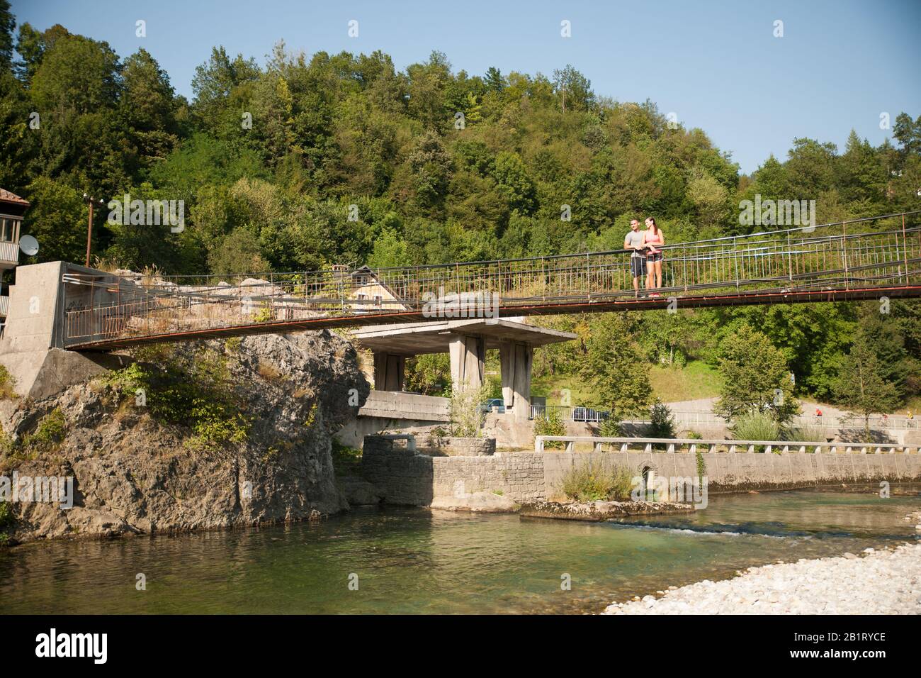 Couple looking over a bridge hi-res stock photography and images - Alamy