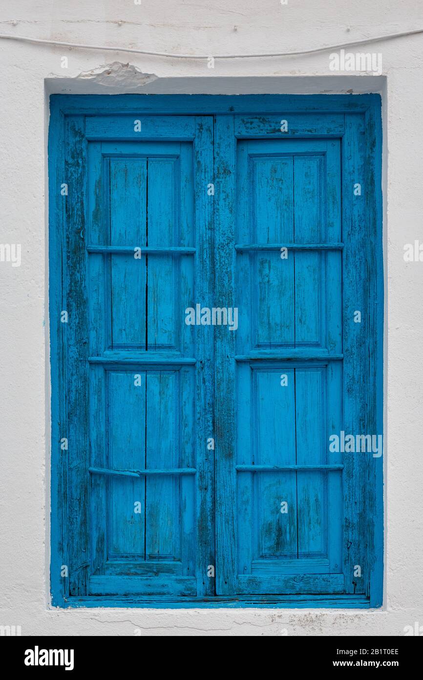 Blue window shutters Stock Photo