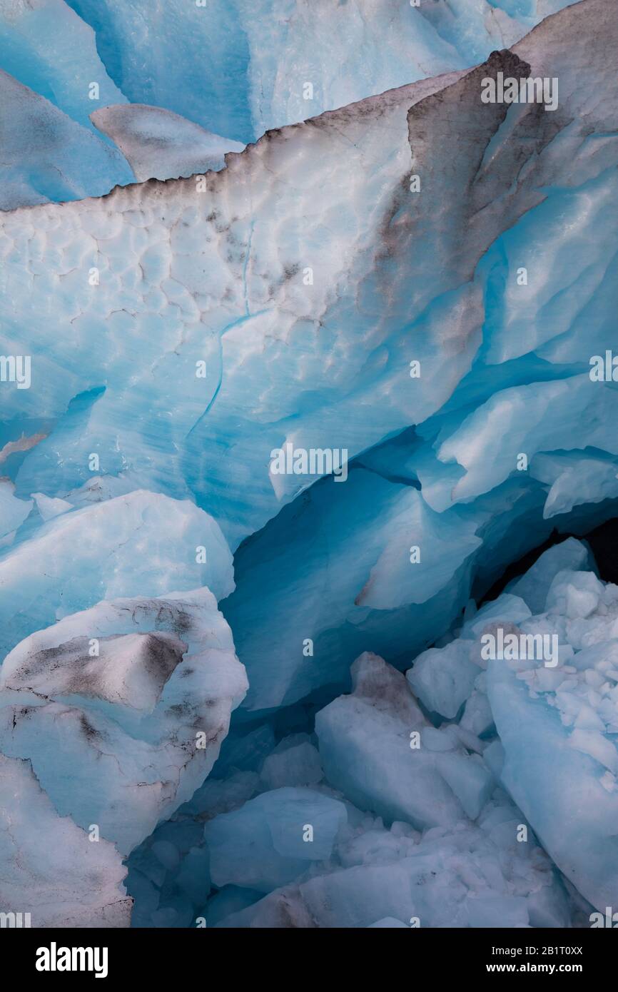 contamination on the glacier wile the ice is melting Stock Photo