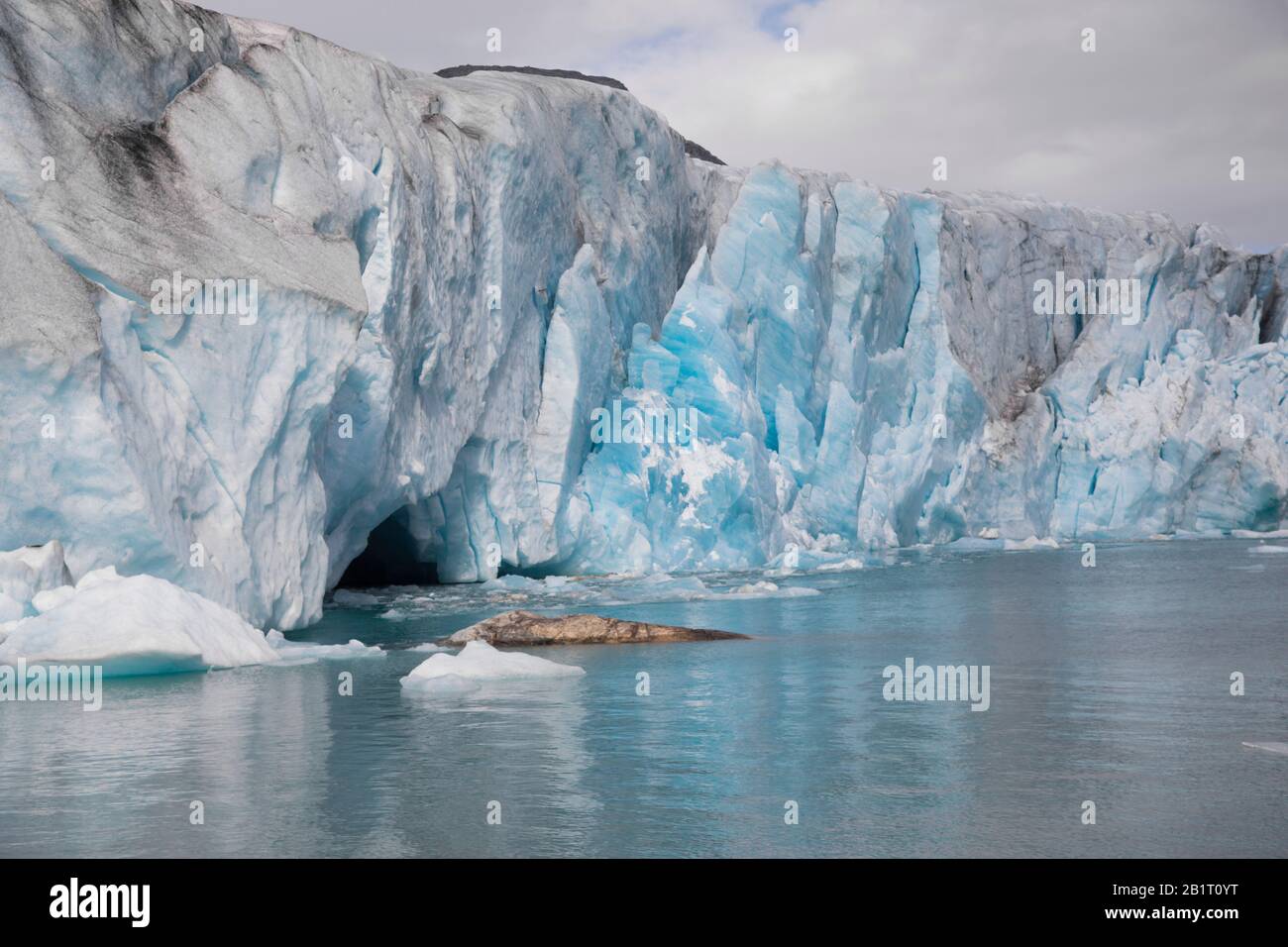 The glacier front on water. Melting and caving ice Stock Photo