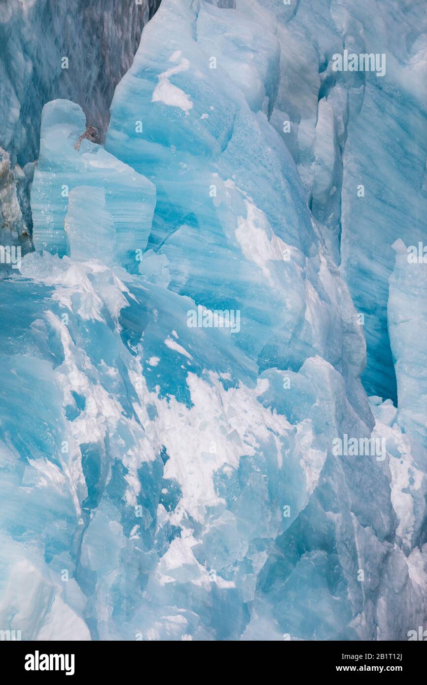 Looking inside the ice in the glacier with great colors Stock Photo