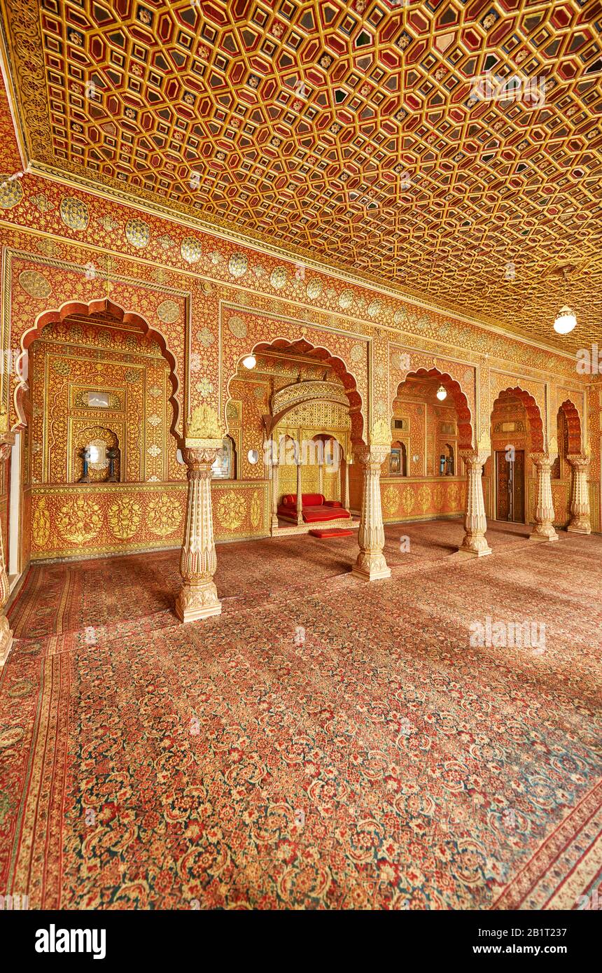 Karan Mahal, public audience hall, emperor throne, Exquisite glass inlay work, room heavily decorated with colored mirrors inside Junagarh Fort Stock Photo