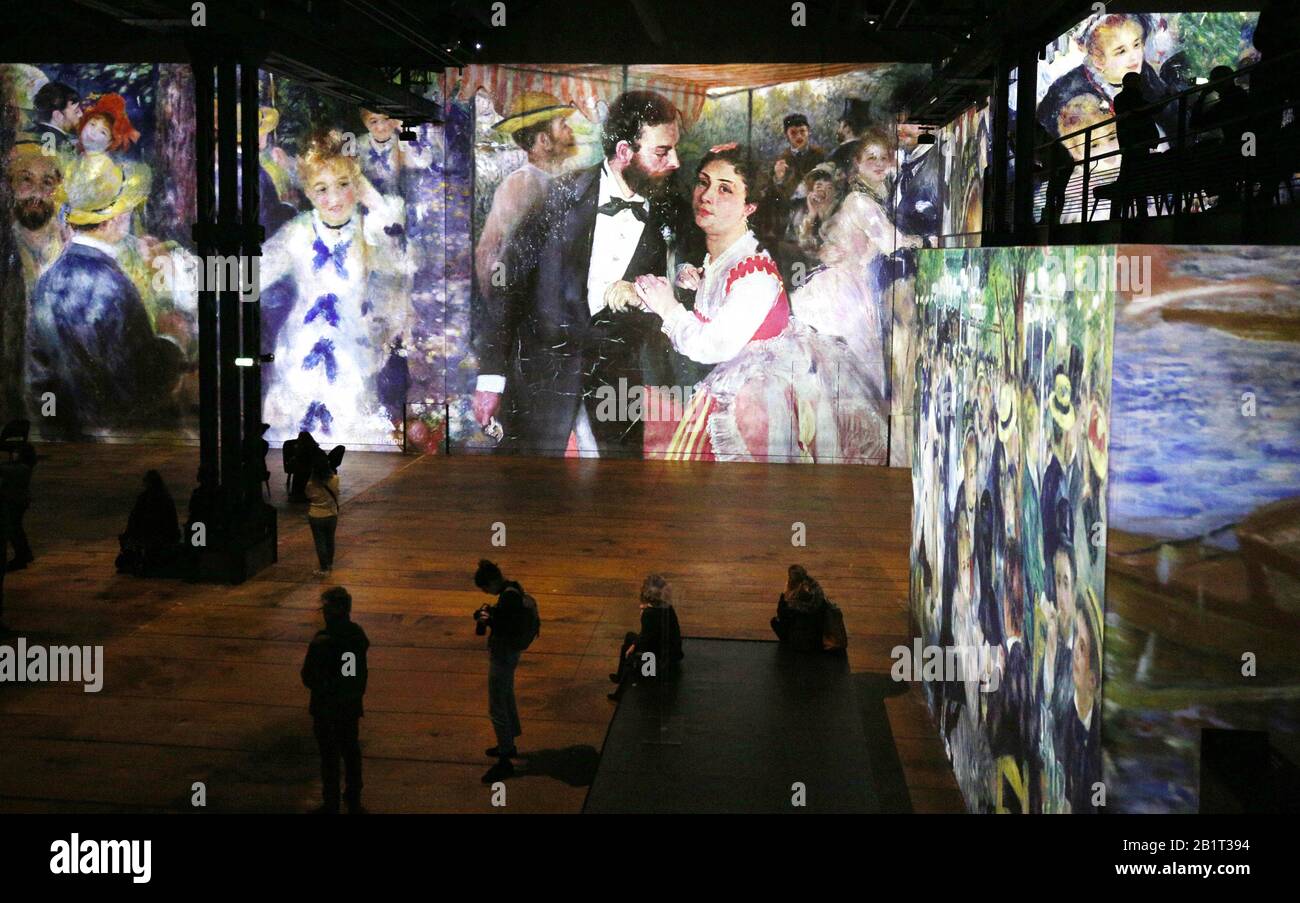 Paris, France. 27th Feb, 2020. People visit the digital exhibition titled 'Monet, Renoir.Chagall: Journeys around the Mediterranean' during a press review in Paris, France, Feb. 27, 2020. The digital exhibition to be held from Feb. 28, 2020 to Jan. 3, 2021 presents visitors with an itinerary that spans the period between Impressionism and modernism. The exhibition immerses visitors in the masterpieces of 20 artists, including Renoir, Monet, Matisse, Chagall etc., and highlights the link between artistic creativity and the Mediterranean shores. Credit: Gao Jing/Xinhua/Alamy Live News Stock Photo