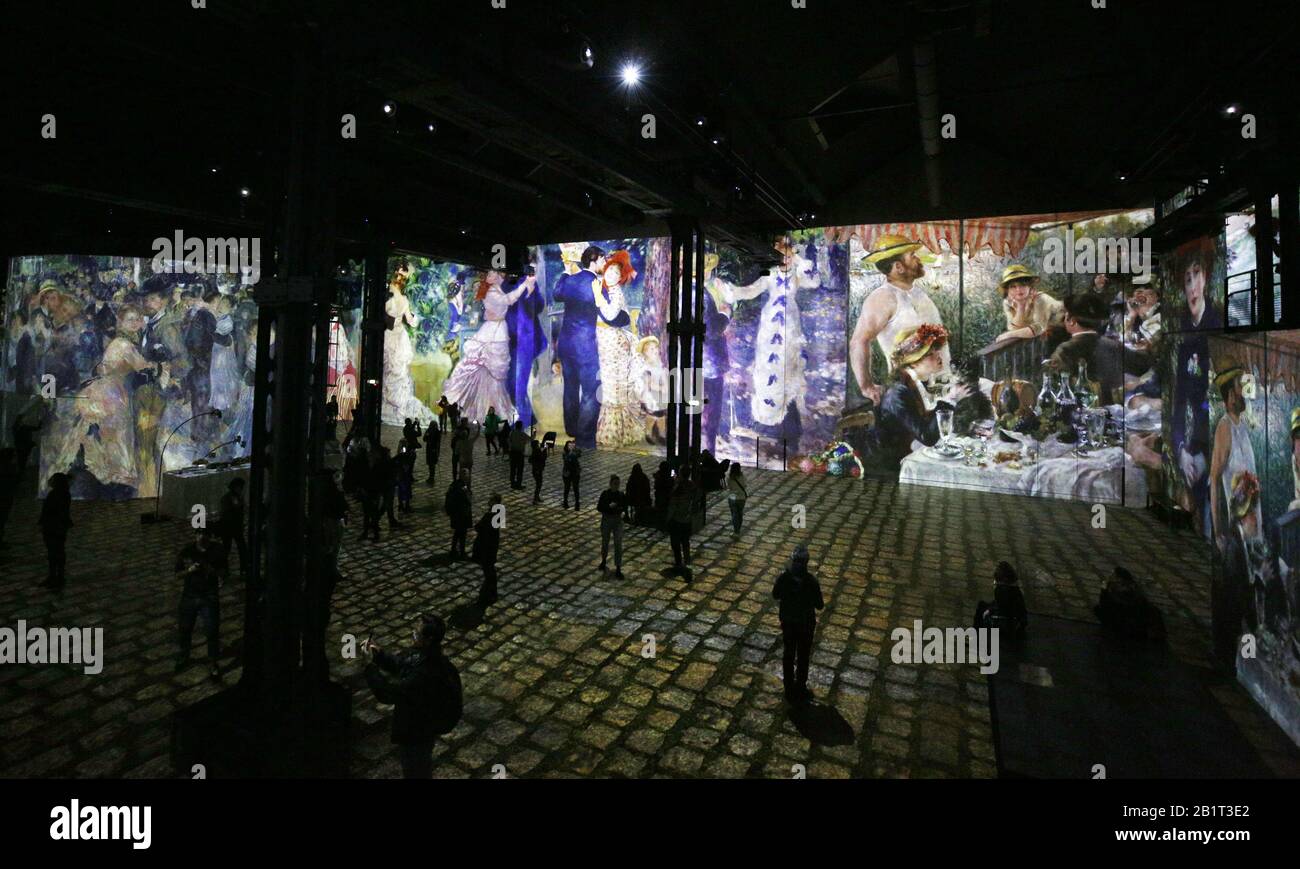 Paris, France. 27th Feb, 2020. People visit the digital exhibition titled 'Monet, Renoir.Chagall: Journeys around the Mediterranean' during a press review in Paris, France, Feb. 27, 2020. The digital exhibition to be held from Feb. 28, 2020 to Jan. 3, 2021 presents visitors with an itinerary that spans the period between Impressionism and modernism. The exhibition immerses visitors in the masterpieces of 20 artists, including Renoir, Monet, Matisse, Chagall etc., and highlights the link between artistic creativity and the Mediterranean shores. Credit: Gao Jing/Xinhua/Alamy Live News Stock Photo