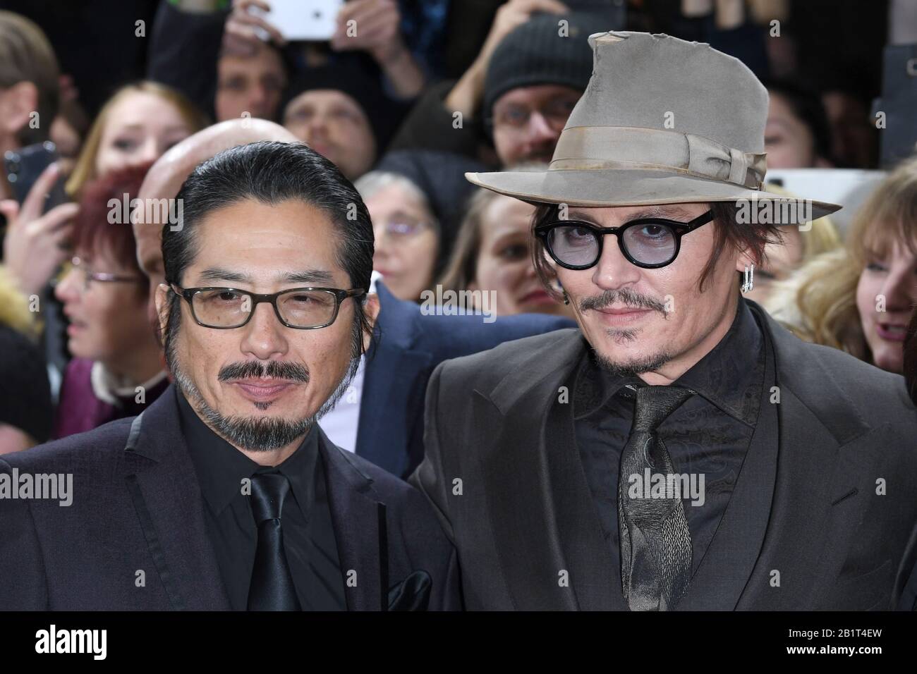 Hiroyuki Sanada and Johnny Depp attend the screening of Minamata during the 70th Berlin Film Festival at the Friedrichstadt-Palast. © Paul Treadway Stock Photo