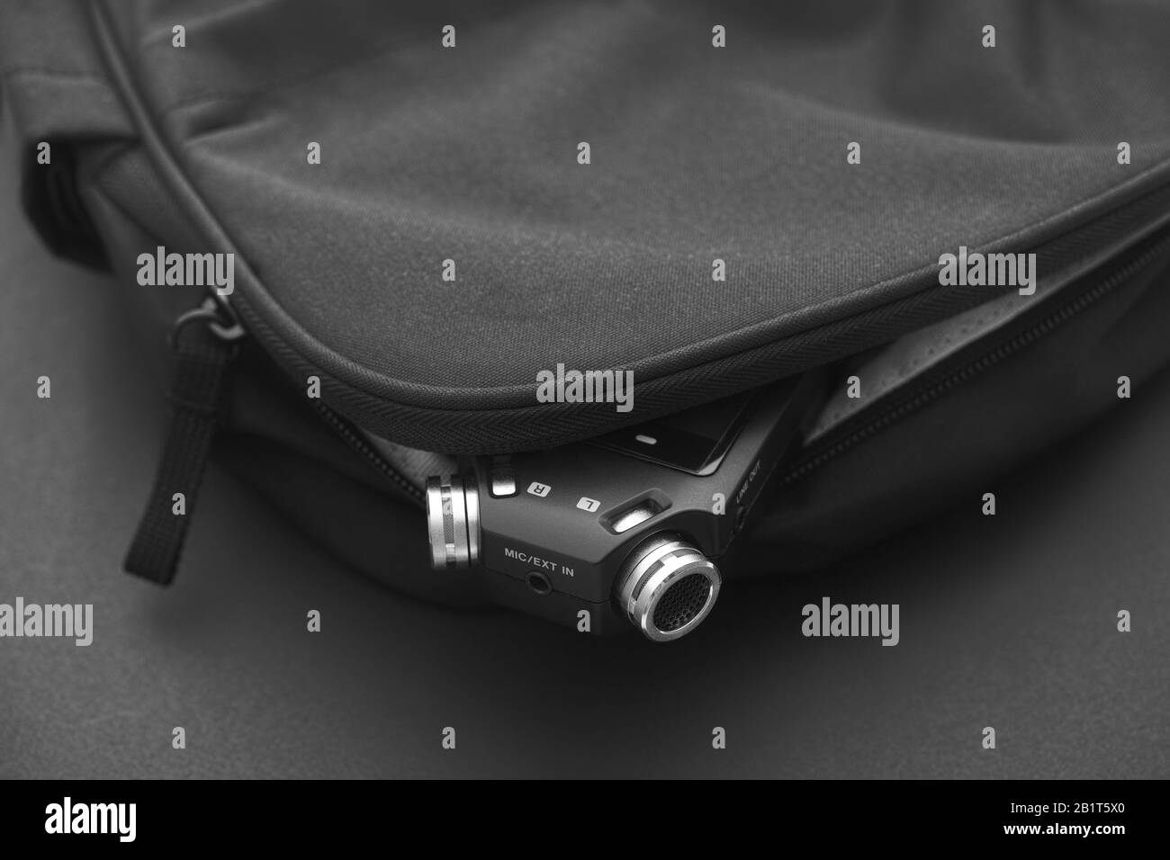 Voice recorder in a backpack. Black and White. Close up. Stock Photo