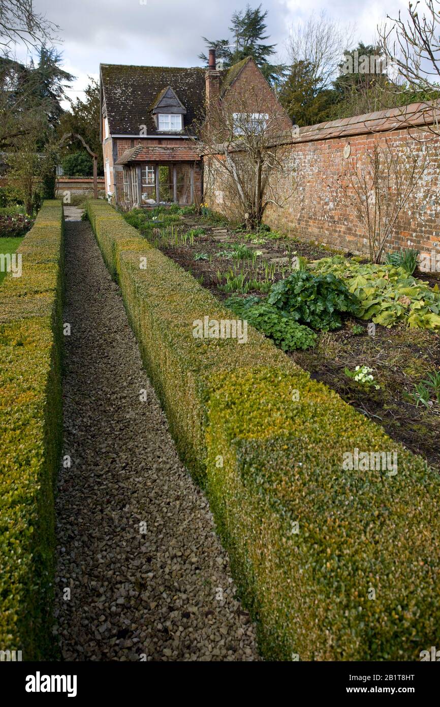 English cottage garden with pathway. Oxfordshire Stock Photo