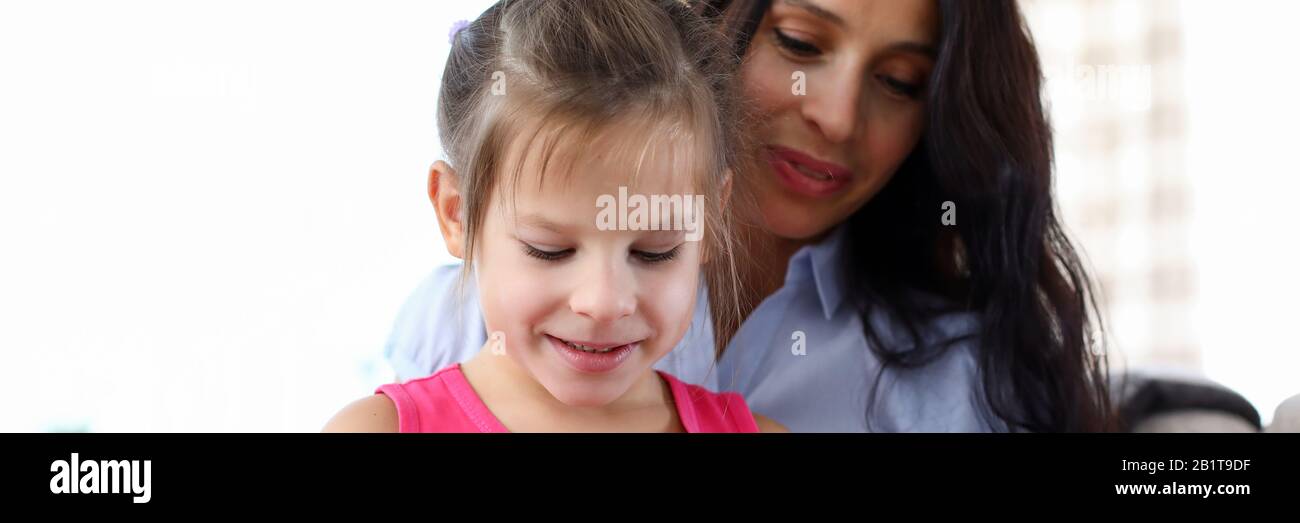 Mommy spending time with girl Stock Photo
