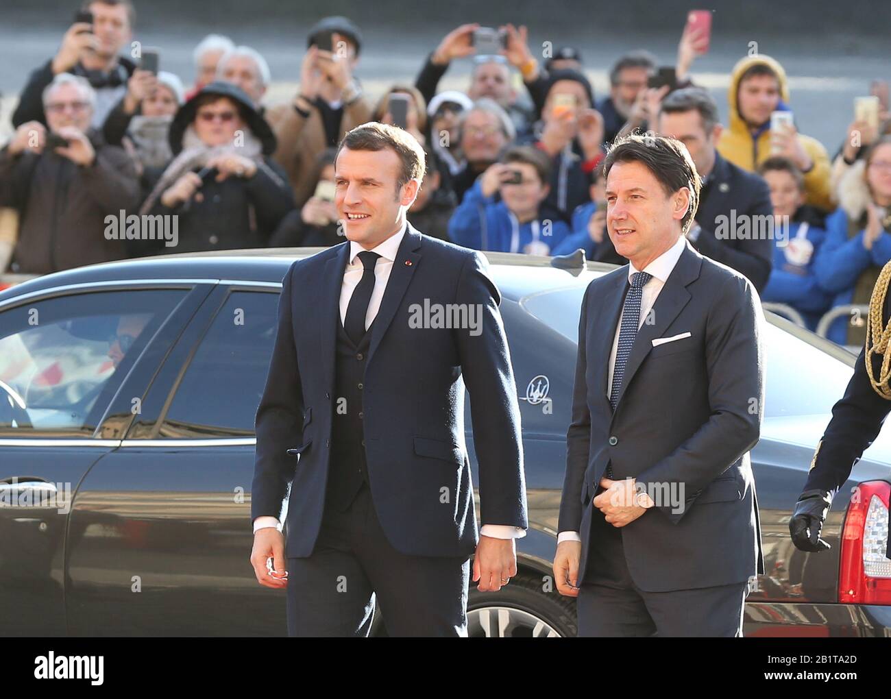 Naples, Italy. 27th Feb, 2020. French President Emmanuel Macron (L) and  Italian Prime Minister Giuseppe Conte arrive at the Royal Palace, venue of  the XXXV Italian-French Summit Credit: Independent Photo Agency Srl/Alamy
