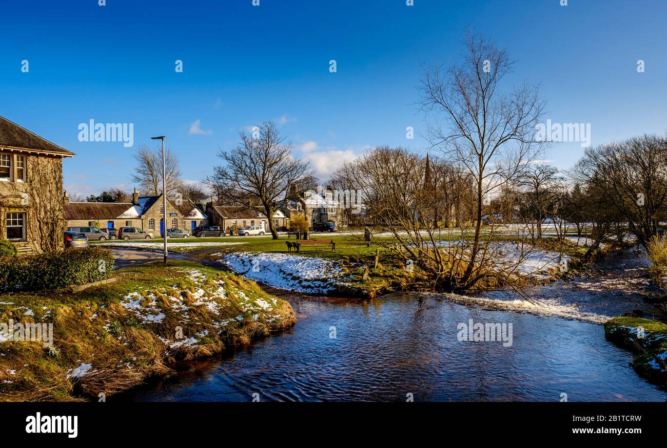 The Lyne Water flowing through the village of West Linton in the