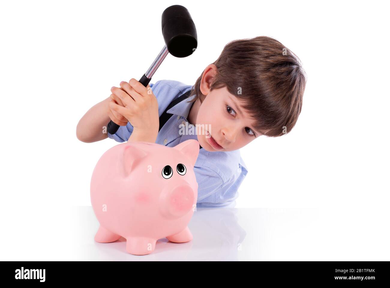 Boy with his piggy bank hi-res stock photography and images - Alamy