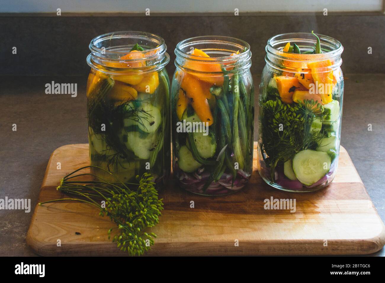 Preserving Garden Fresh Vegetables in Canning Jars Stock Photo