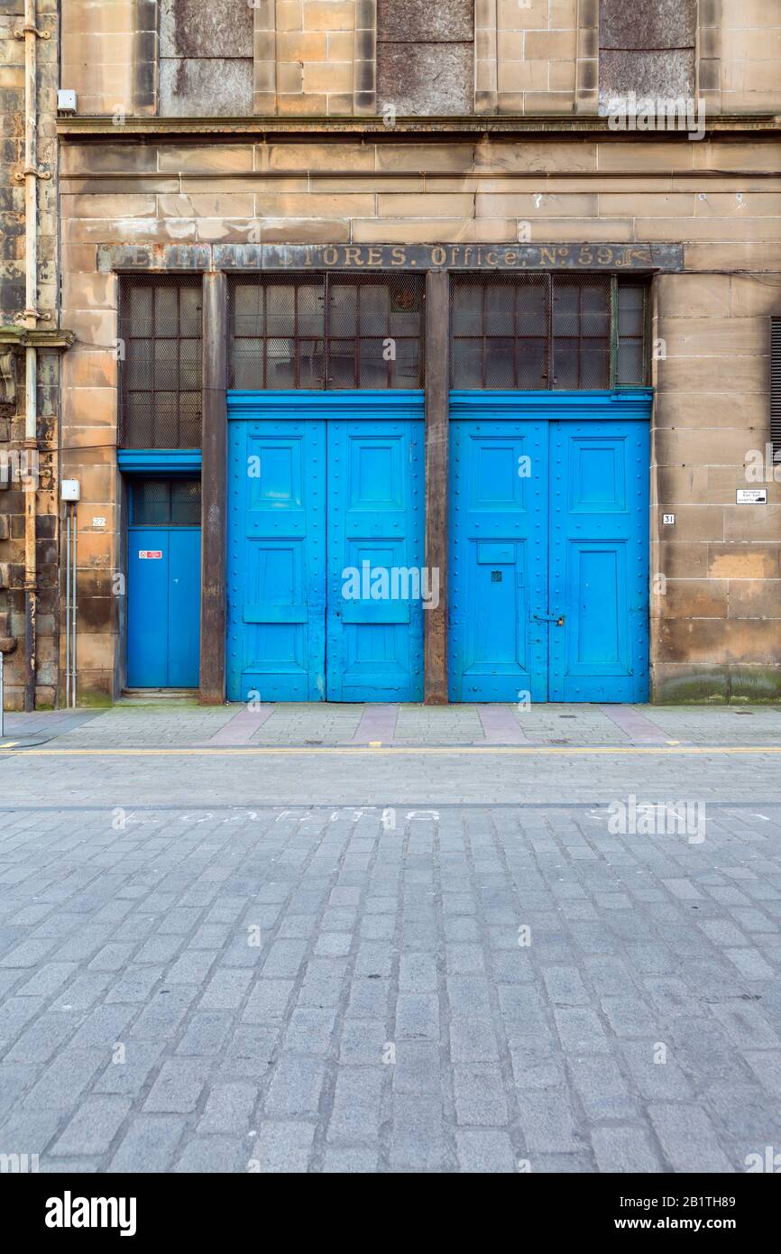 Old blue doors, James Watt Street, Glasgow city centre, Scotland, UK Stock Photo