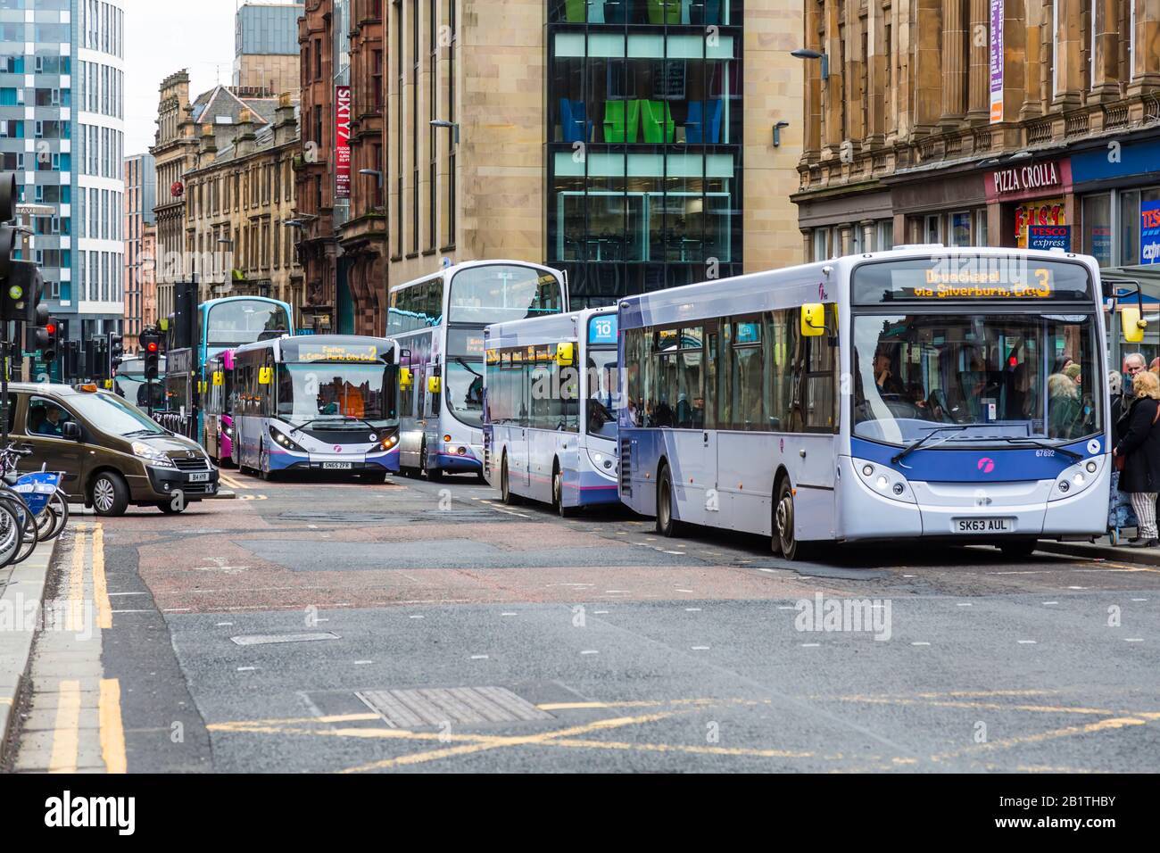 Buses on Hope Street in Glasgow city centre, Scotland, UK Stock Photo